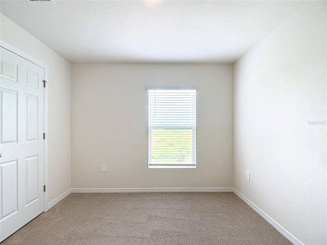 unfurnished bedroom featuring carpet flooring