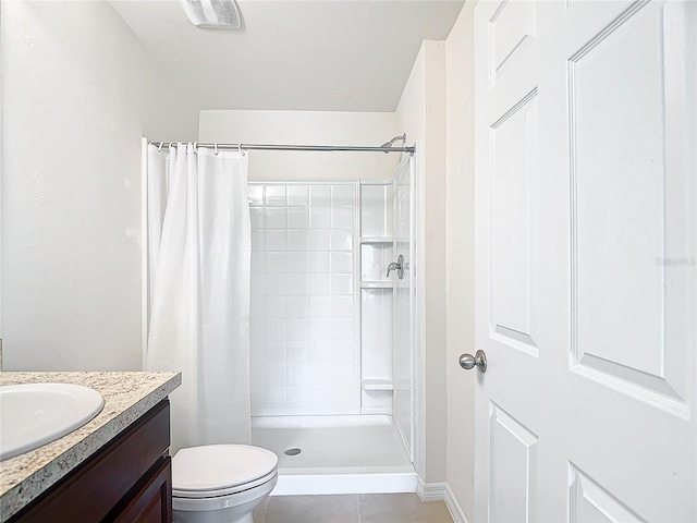 bathroom with vanity, tile patterned flooring, a shower with shower curtain, and toilet