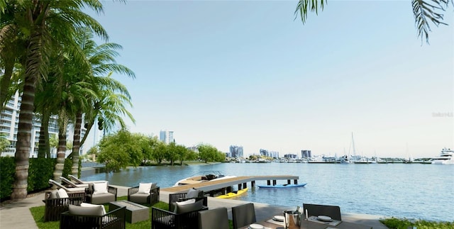 property view of water featuring a city view and a boat dock