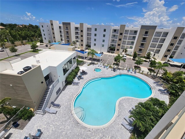 view of swimming pool with a patio