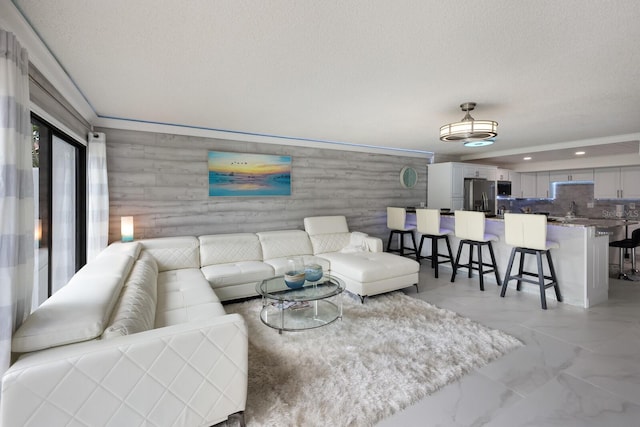 living room featuring a textured ceiling