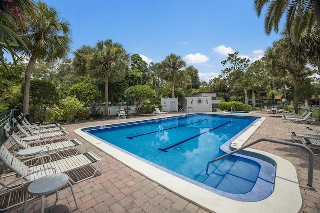 view of swimming pool featuring a patio