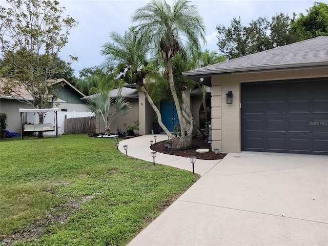 view of yard with a garage