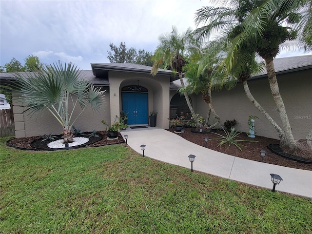 view of front of home with a front lawn