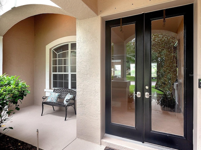 doorway to property featuring french doors