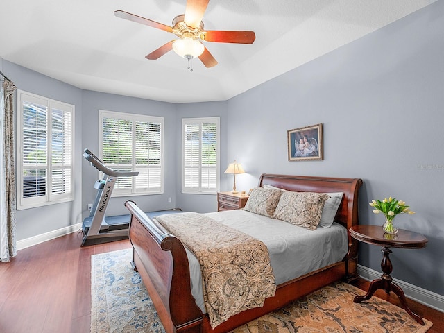 bedroom featuring dark wood-type flooring and ceiling fan