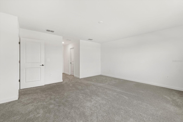 empty room with carpet flooring