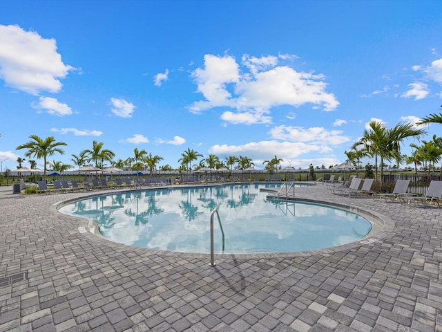 view of swimming pool with a patio area