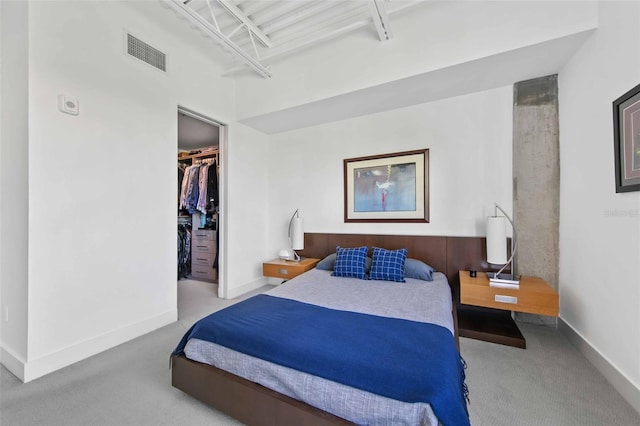 bedroom featuring a closet and carpet flooring