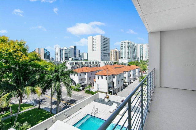 balcony with a community pool