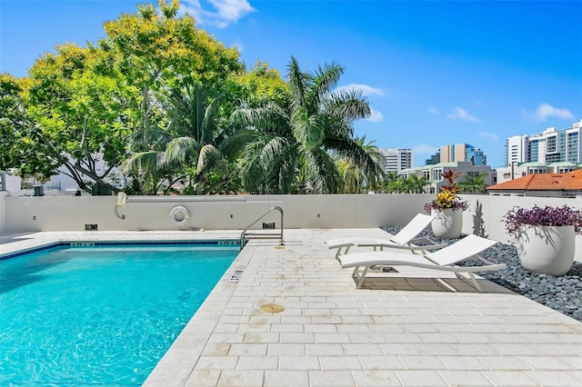 view of pool with a patio