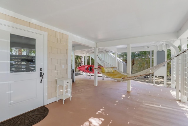 entrance foyer featuring concrete flooring