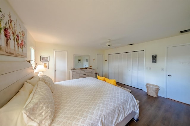 bedroom featuring dark hardwood / wood-style flooring and ceiling fan