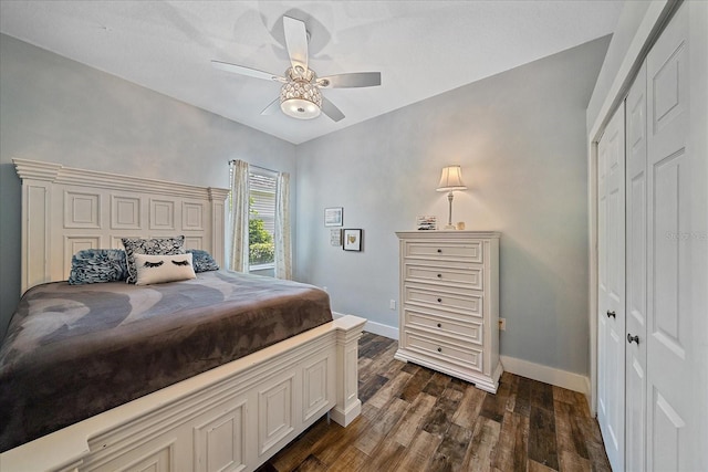 bedroom featuring a closet, ceiling fan, and dark wood-type flooring