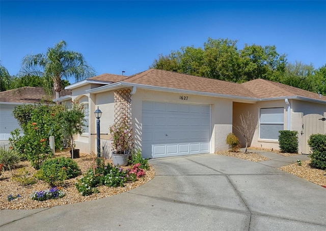 single story home with a garage