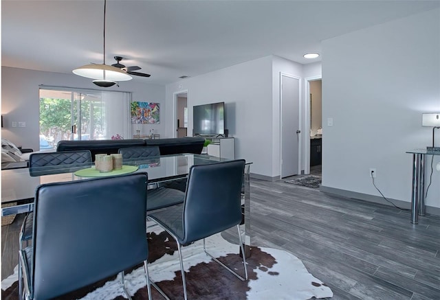 interior space featuring dark hardwood / wood-style flooring and ceiling fan