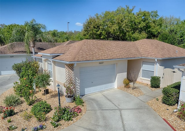 ranch-style home featuring a garage