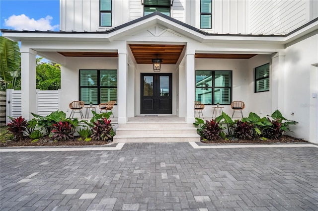 entrance to property with a porch