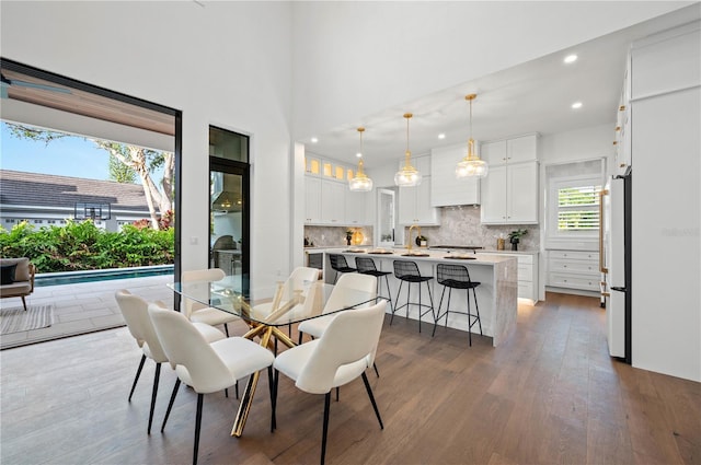 dining room with dark hardwood / wood-style floors