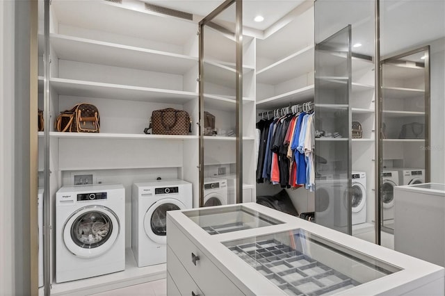 laundry room featuring washing machine and dryer