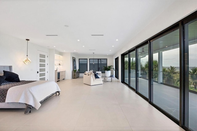 tiled bedroom featuring access to exterior