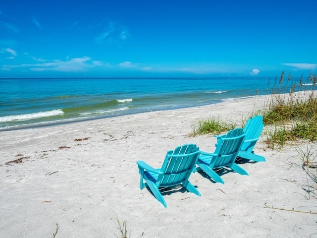 property view of water with a beach view