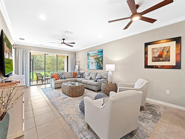 living room featuring light tile patterned floors, ornamental molding, and ceiling fan