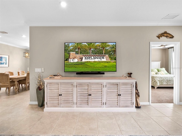 tiled living room featuring crown molding