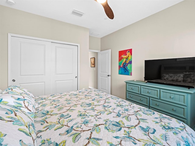 bedroom featuring ceiling fan and a closet