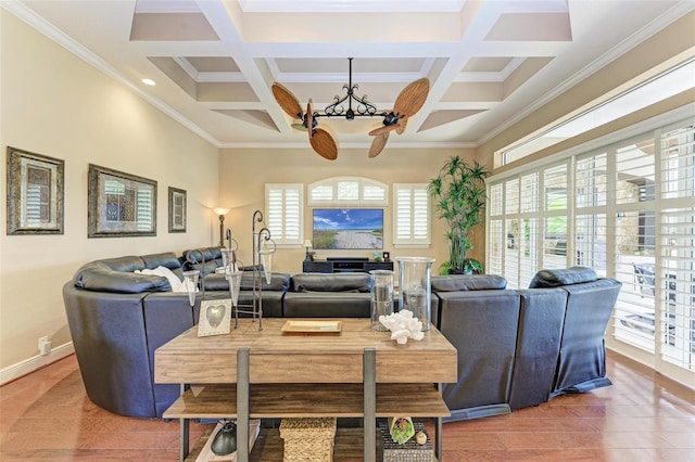 living room featuring coffered ceiling, hardwood / wood-style flooring, and a healthy amount of sunlight