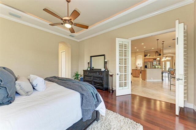 tiled bedroom with stainless steel fridge, crown molding, french doors, and ceiling fan