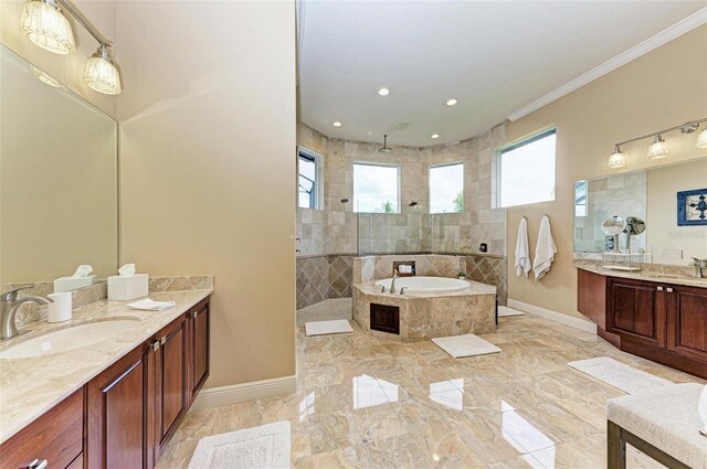 bathroom with ornamental molding, vanity, tile patterned floors, and shower with separate bathtub