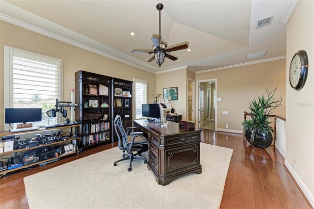 office area featuring wood-type flooring, ceiling fan, and crown molding