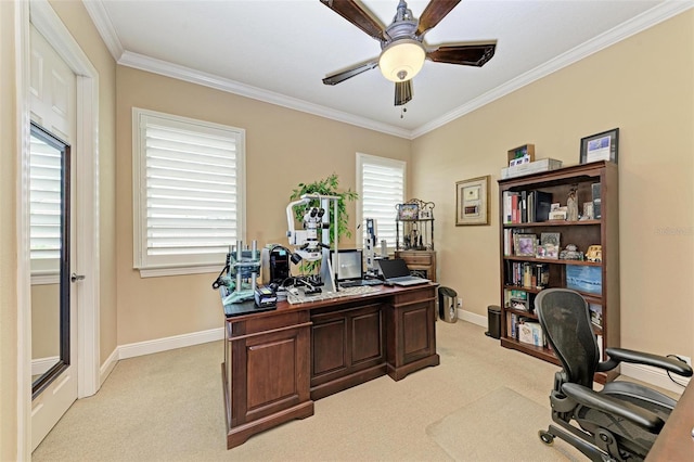 home office with ornamental molding, light carpet, and ceiling fan