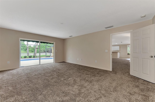 empty room featuring carpet floors