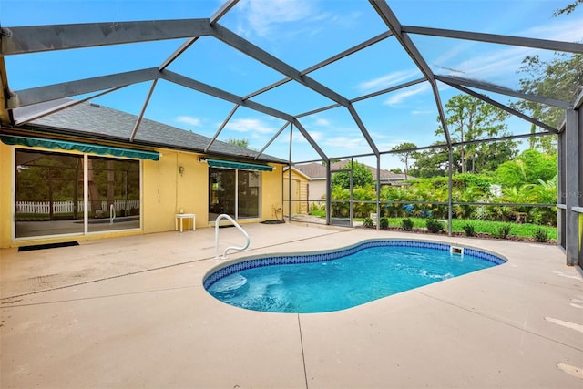 view of pool featuring a patio area and a lanai