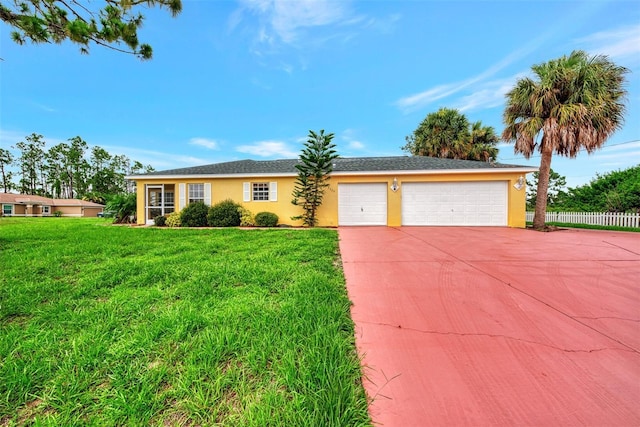 single story home with concrete driveway, an attached garage, fence, a front lawn, and stucco siding