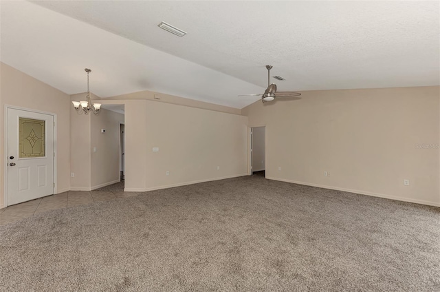 unfurnished living room featuring light carpet, lofted ceiling, and ceiling fan with notable chandelier