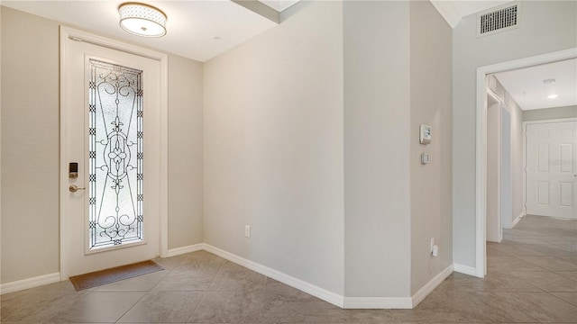 view of tiled entrance foyer