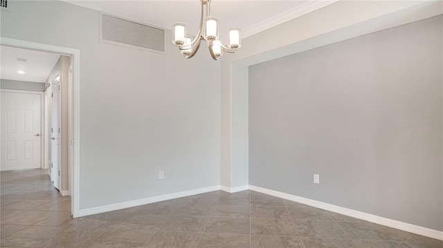 tiled empty room featuring crown molding and an inviting chandelier