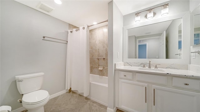 full bathroom with tile patterned flooring, toilet, vanity, and shower / tub combo with curtain