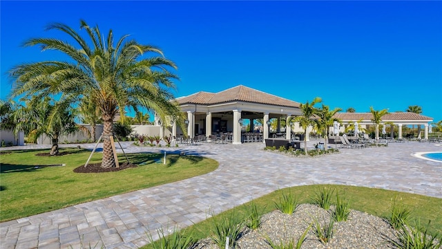 surrounding community featuring a gazebo, a yard, and a patio