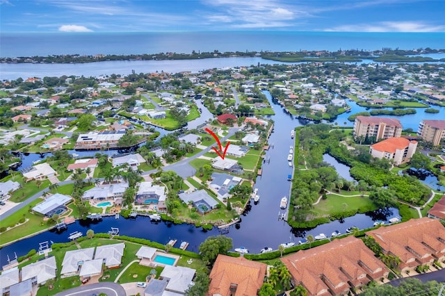 drone / aerial view featuring a water view