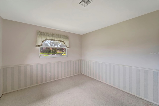 spare room with carpet flooring