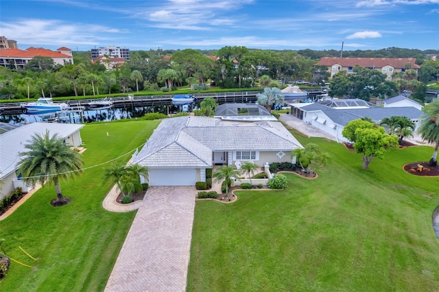 drone / aerial view with a water view