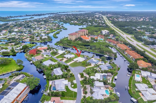 bird's eye view with a water view