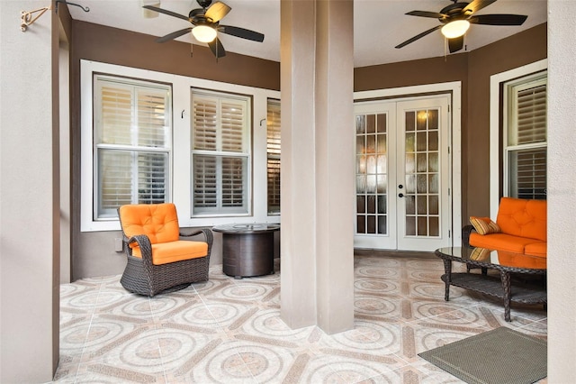 view of patio with ceiling fan and french doors