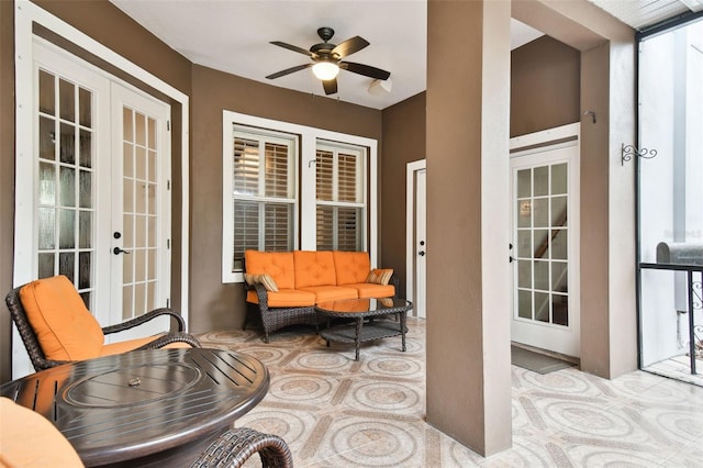 view of patio with ceiling fan and french doors