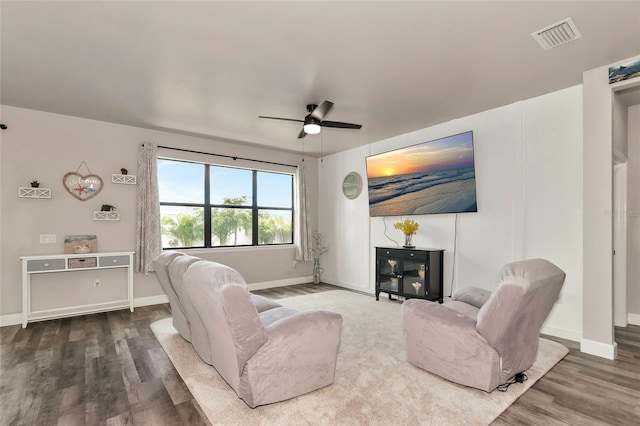 2352 Marton Oak Blvd, North Port, FL 34289 - living room with wood finished floors, ceiling fan, and baseboards