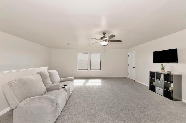 2352 Marton Oak Blvd, North Port, FL 34289 - carpeted living room featuring baseboards and ceiling fan